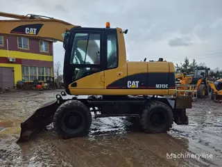 Cat M313C — Foto 5