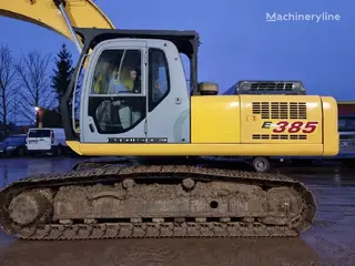 New Holland 349 Kobelco E385 — Foto 4