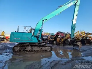 Kobelco 349 SK210LC-9 — Foto 9
