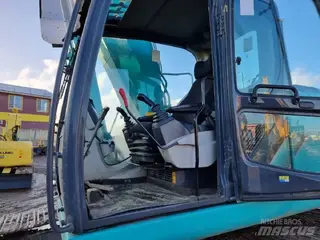 Kobelco 349 SK210LC-9 — Foto 10