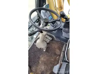 Komatsu 349 PW130-7K — Foto 9