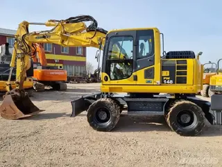 Komatsu 315 PW148-8 — Mobilbagger — gebraucht kaufen | 123Machinery