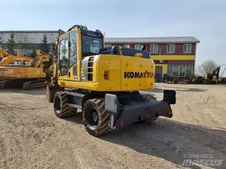 Komatsu 315 PW148-8 — Foto 2