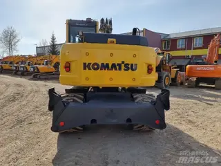 Komatsu 315 PW148-8 — Foto 4