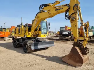 Komatsu 315 PW148-8 — Foto 6