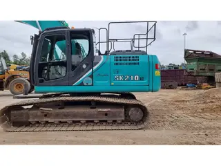 Kobelco 315 SK210LC — Foto 5